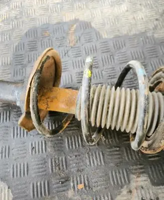 Subaru Legacy Front shock absorber with coil spring
