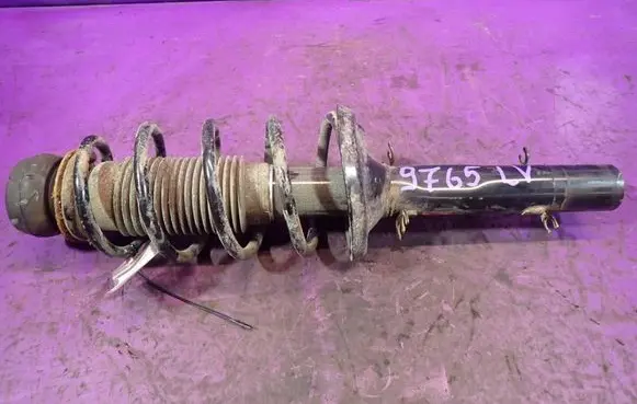 Volkswagen Golf IV Front shock absorber with coil spring 