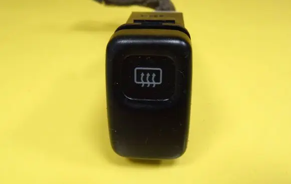 Mazda 323 Windscreen/window heater switch