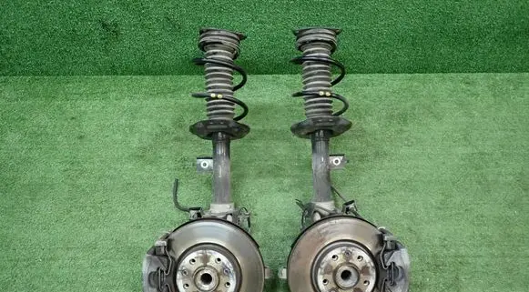 Front wheel hub spindle knuckle