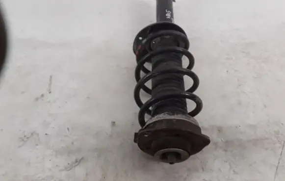 Volkswagen Caddy Front shock absorber with coil spring 1K0412331