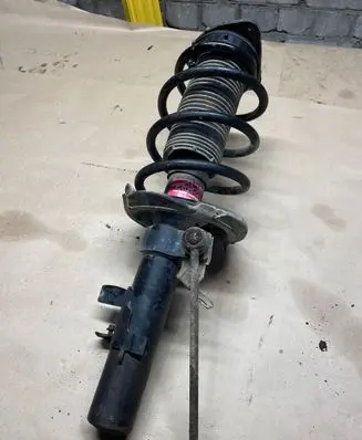 Front shock absorber with coil spring