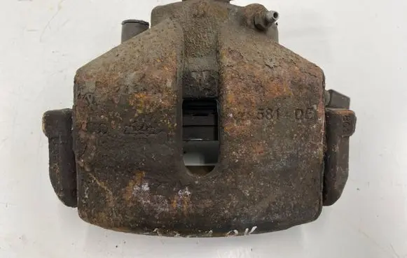 Volkswagen Touran I Front brake caliper 1K0615123E 1K0615123