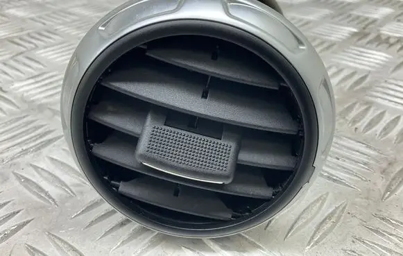 Dash center air vent grill