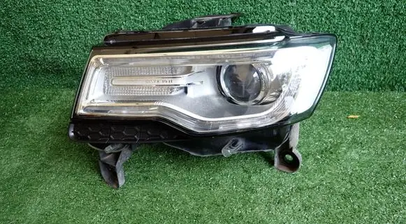 Jeep Grand Cherokee Headlight/headlamp 68144709AG
