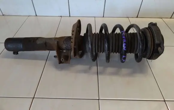 Volkswagen Touran I Front shock absorber with coil spring 1K0400053CD