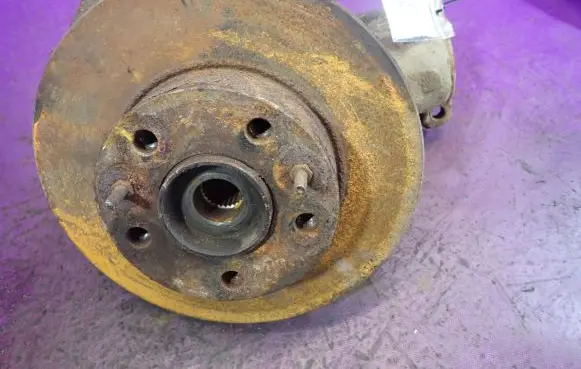 Front wheel hub spindle knuckle