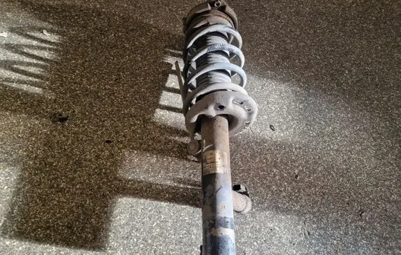 Volkswagen PASSAT CC Front shock absorber with coil spring