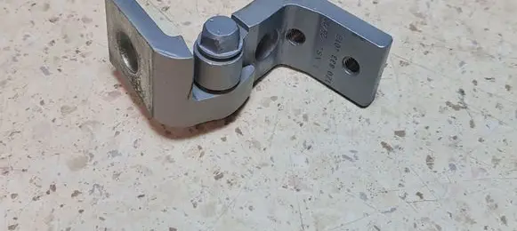 Rear door upper hinge