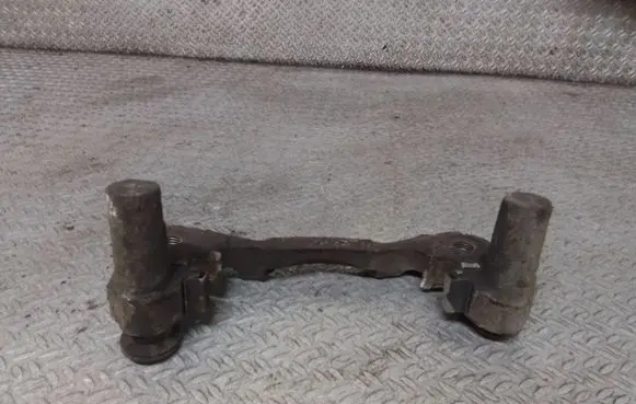 Mitsubishi Lancer VIII Brake caliper pad carrier rear 