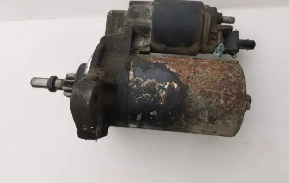 Volkswagen Golf II Starter motor 1005821499
