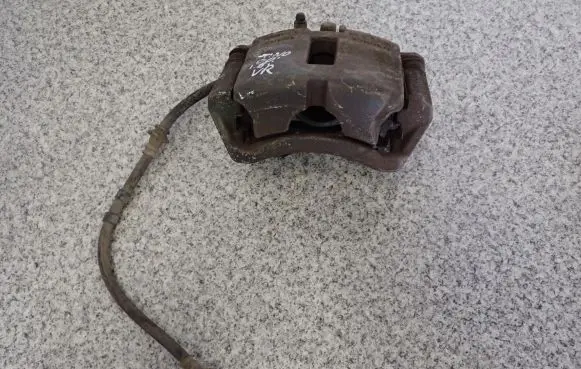 Nissan Almera Tino Front brake caliper