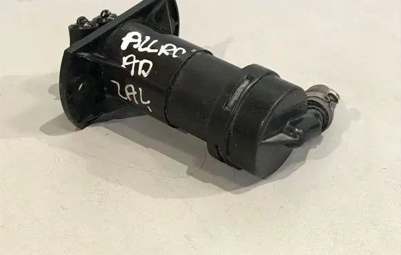 Headlight washer spray nozzle
