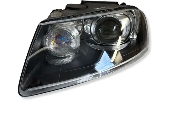 Volkswagen Touareg I Headlight/headlamp 7L6941015CM 89311931