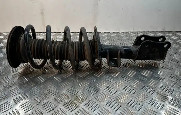 Front shock absorber with coil spring