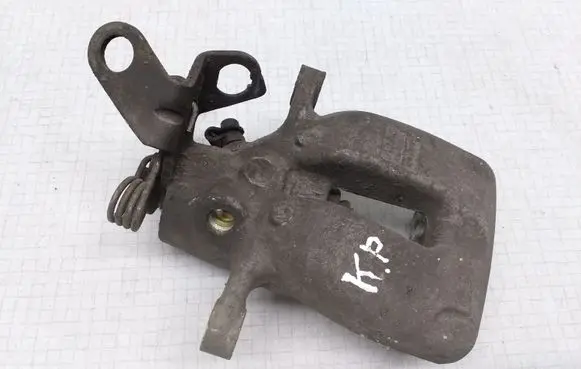 Volkswagen Golf V Front brake caliper