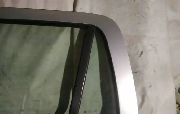 Opel Astra G Rear vent window glass 