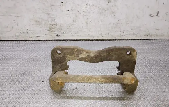 Subaru Forester SF Front Brake Caliper Pad/Carrier 