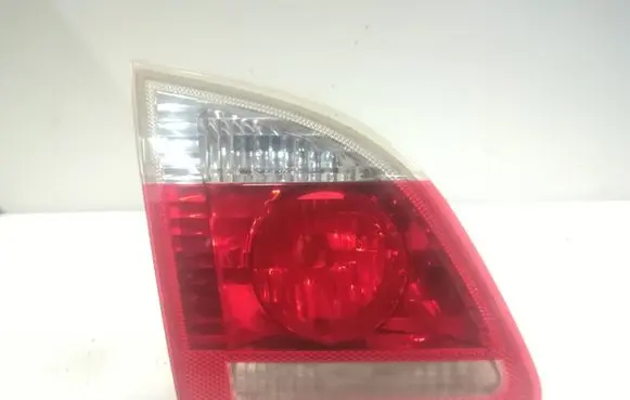 Tail light bulb cover holder