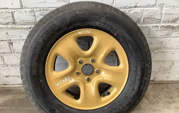 Suzuki Grand Vitara I R16 spare wheel 42408C26 T16X65J