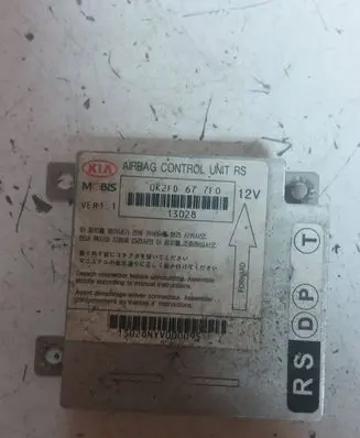KIA Carens I Airbag control unit/module 13028