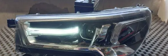 Toyota Hilux VIII Headlight/headlamp 811500KU80 1EJ923363030B