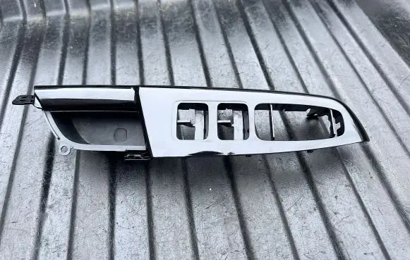 KIA Sportage Front door window switch trim 82741F1000