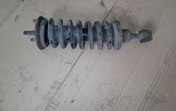 Nissan Navara D40 Front shock absorber with coil spring NOCODE