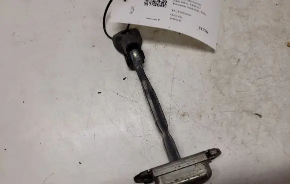 Toyota Yaris Front door check strap stopper