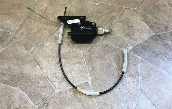 Fuel tank cap lock motor