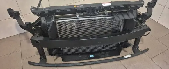 Radiator support slam panel
