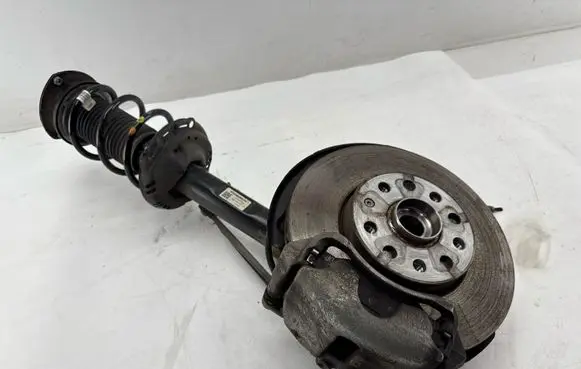 Front wheel hub spindle knuckle
