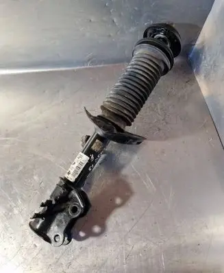 Opel Corsa D Front shock absorber/damper 13343099