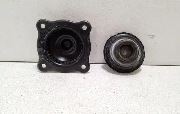Volkswagen Touareg II Front shock absorber mounting bracket 7P0412327B