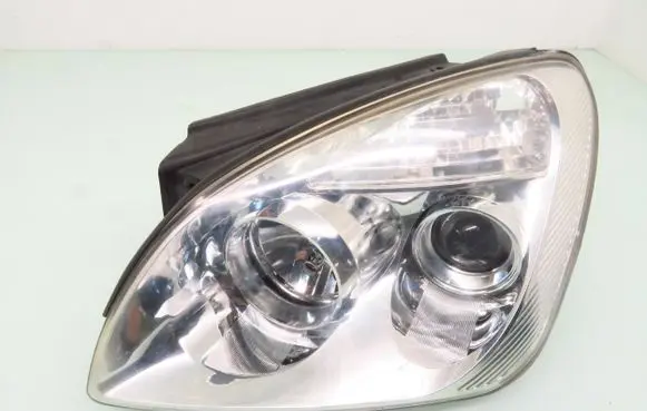 KIA Carens III Headlight/headlamp