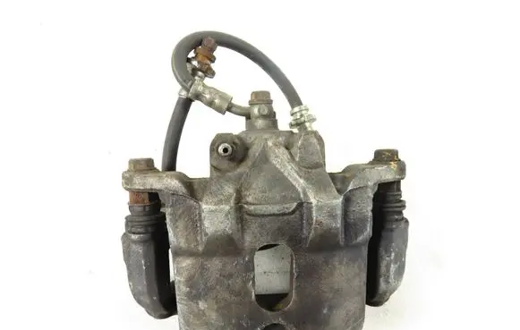 Nissan Maxima A34 Front brake caliper