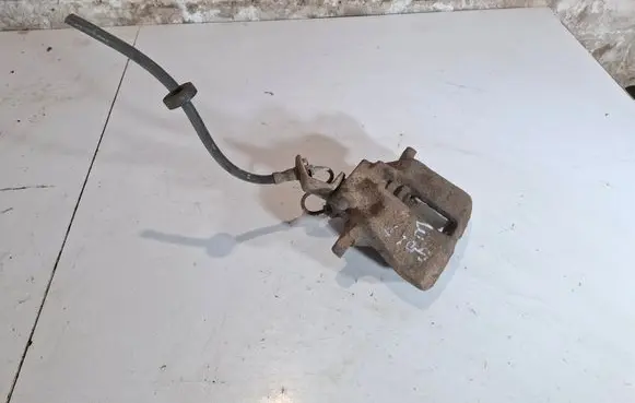 Volkswagen Golf III Front brake caliper