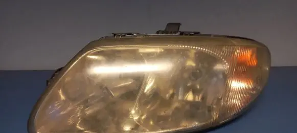 Chrysler Voyager Headlight/headlamp 04857703ABD