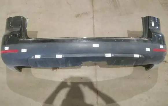 Volkswagen Touareg I Rear bumper JUODAS