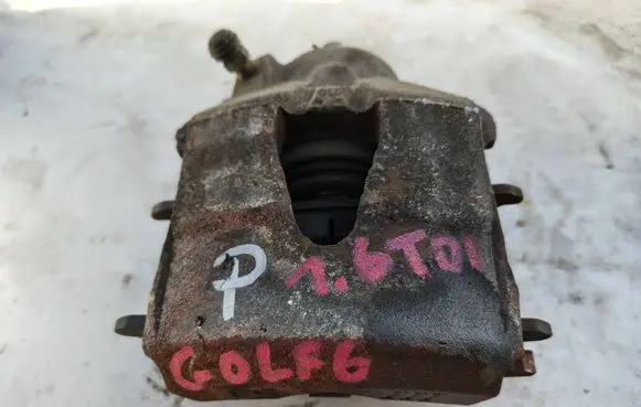 Volkswagen Golf VI Front brake caliper 