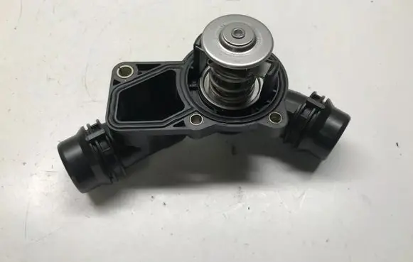 Thermostat/thermostat housing