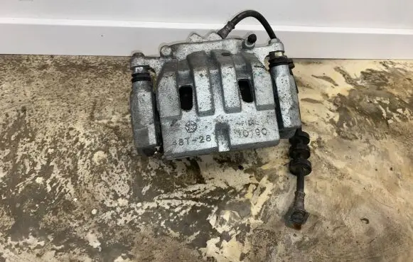 Jeep Cherokee Front brake caliper 48T2810190 48T28 F144