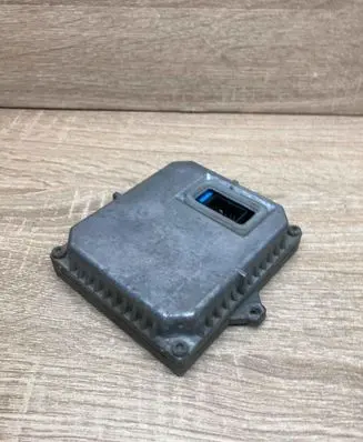 Volkswagen Touran I Headlight ballast module Xenon 1T0907391 1307329090