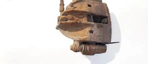 Mitsubishi Carisma Front brake caliper 323261124