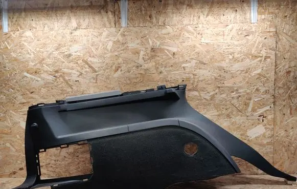 Trunk/boot lower side trim panel