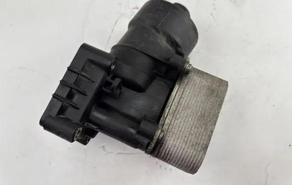 Volkswagen PASSAT B7 Oil filter mounting bracket 03L117021C