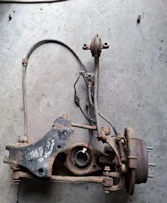 Rear wheel hub spindle/knuckle