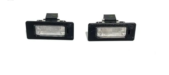 Volkswagen PASSAT B7 Number plate light 8T0943021 32342