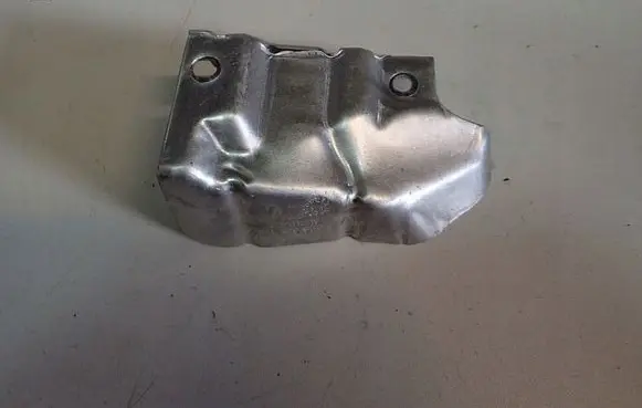 Volkswagen Golf VII Heat shield in engine bay 04L129969J