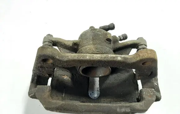 Volkswagen Golf VII Front brake caliper